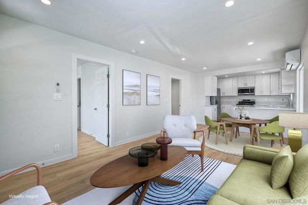 Dining room, Interior, Kitchen, Living room, Recessed Lighting, Stainless Steel Appliances, Wood Texture Flooring