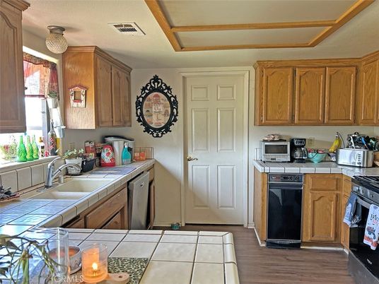 Interior, Kitchen, Tile Countertops, Wood Texture Flooring