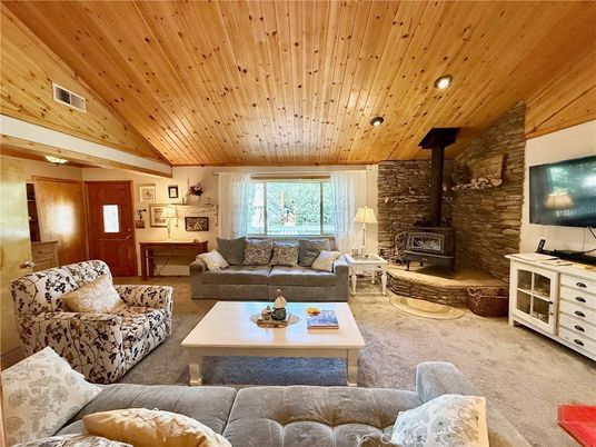 Fireplace, Interior, Living room, Recessed Lighting, Stone Walls, Wooden Ceilings