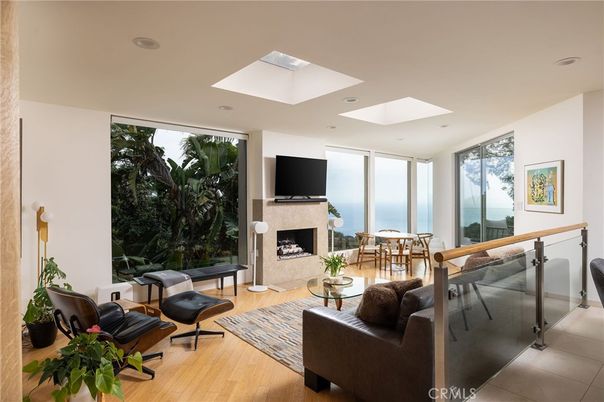 Fireplace, Interior, Living room, Recessed Lighting, Water, Wood Texture Flooring