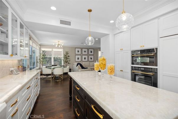 Chandelier, Dining room, Interior, Kitchen, Pendant Lights, Recessed Lighting, Stainless Steel Appliances, Wood Texture Flooring