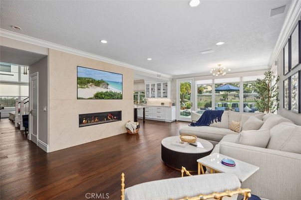 Chandelier, Fireplace, Interior, Living room, Recessed Lighting, Wood Texture Flooring