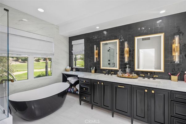 Bathroom, Dual Sink Vanities, Free Standing Baths, Glass Shower, Interior, Marble Walls, Recessed Lighting