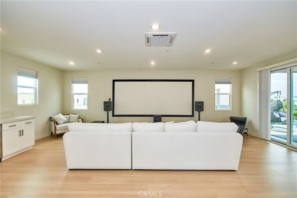Interior, Living room, Projection Screen, Recessed Lighting, Wood Texture Flooring