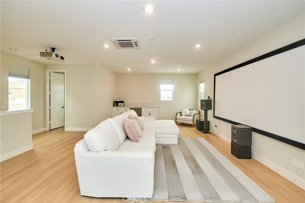 Interior, Living room, Projection Screen, Recessed Lighting, Wood Texture Flooring