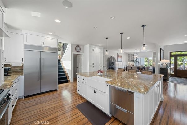 Dining room, Interior, Kitchen, Living room, Pendant Lights, Recessed Lighting, Stainless Steel Appliances, Wood Texture Flooring