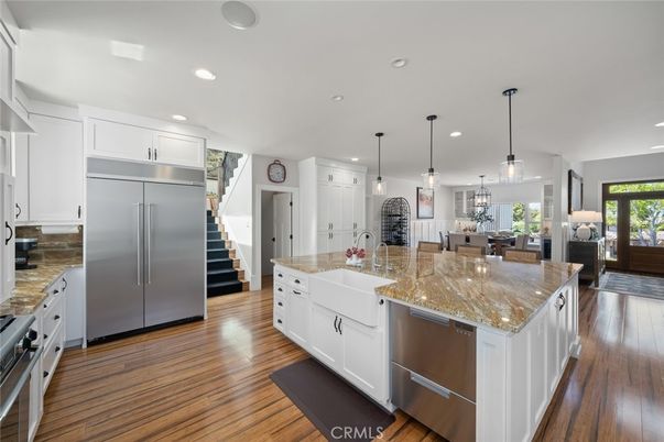 Dining room, Interior, Kitchen, Pendant Lights, Recessed Lighting, Stainless Steel Appliances, Wood Texture Flooring