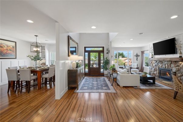 Dining room, Fireplace, Interior, Living room, Pendant Lights, Recessed Lighting, Wood Texture Flooring