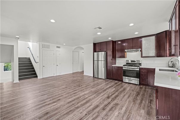 Interior, Kitchen, Recessed Lighting, Stainless Steel Appliances, Wood Texture Flooring