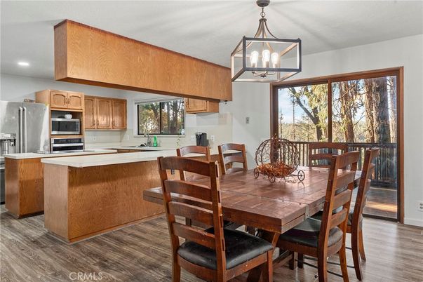 Dining room, Interior, Kitchen, Recessed Lighting, Stainless Steel Appliances, Wood Texture Flooring
