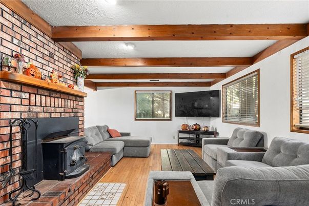 Fireplace, Interior, Living room, Stone Walls, Wooden Beams, Wood Texture Flooring