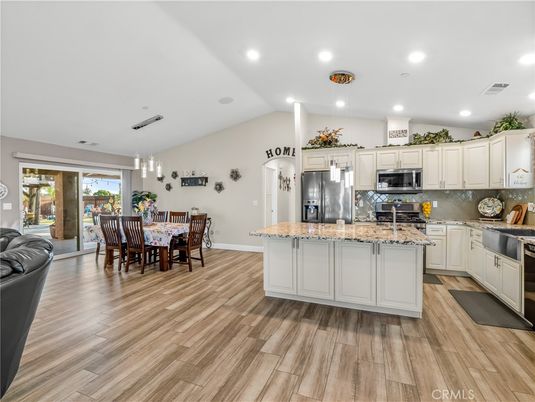 Dining room, Interior, Kitchen, Pendant Lights, Recessed Lighting, Stainless Steel Appliances, Wood Texture Flooring