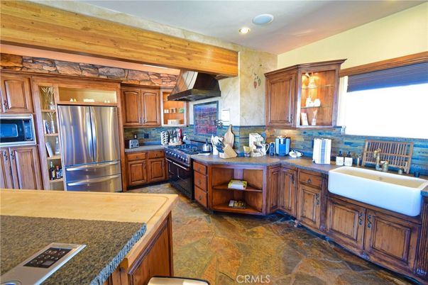 Interior, Kitchen, Recessed Lighting, Stainless Steel Appliances, Stone Walls
