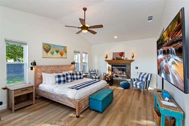 Bedroom, Fireplace, Interior, Recessed Lighting, Wood Texture Flooring