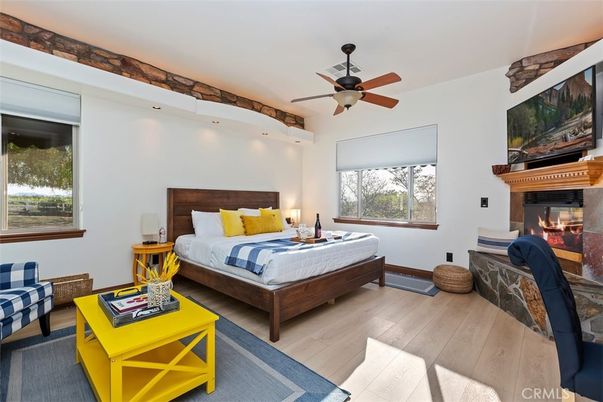 Bedroom, Fireplace, Interior, Recessed Lighting, Wood Texture Flooring