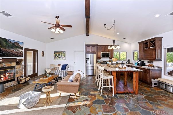 Fireplace, Interior, Kitchen, Living room, Pendant Lights, Recessed Lighting, Stainless Steel Appliances, Wooden Beams