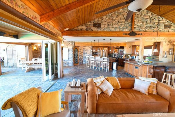 Dining room, Interior, Kitchen, Living room, Pendant Lights, Stainless Steel Appliances, Stone Walls, Wooden Beams, Wooden Ceilings