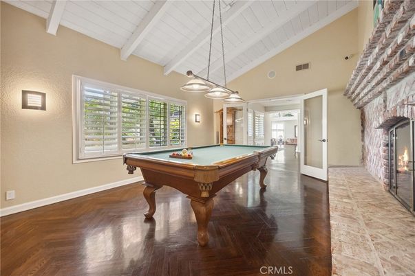 Billiard Table, Fireplace, Game Room, Interior, Pendant Lights, Wood Texture Flooring