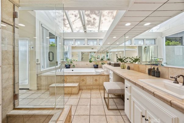 Bathroom, Dual Sink Vanities, Glass Shower, Interior, Recessed Lighting, Tile Countertops