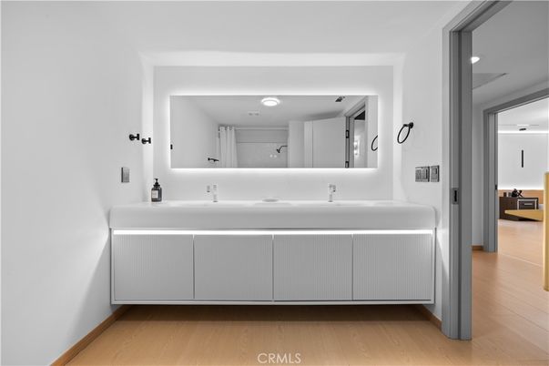 Bathroom, Dual Sink Vanities, Interior, Recessed Lighting, Wood Texture Flooring