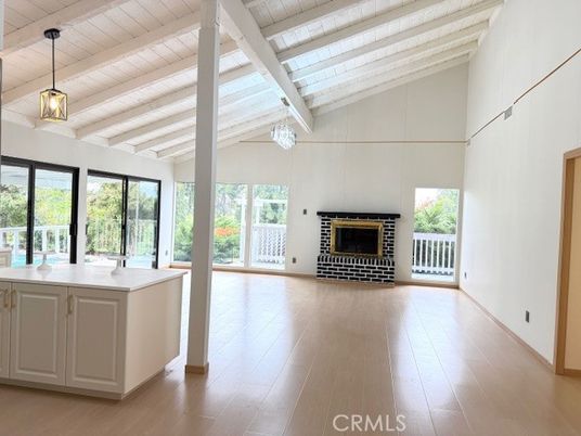 Empty room, Fireplace, Interior, Pendant Lights, Wooden Beams, Wooden Ceilings, Wood Texture Flooring