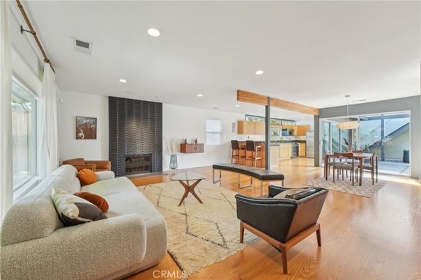Dining room, Fireplace, Interior, Living room, Pendant Lights, Recessed Lighting, Wood Texture Flooring