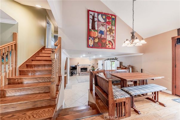 Chandelier, Dining room, Fireplace, Interior, Pendant Lights, Recessed Lighting, Wood Texture Flooring