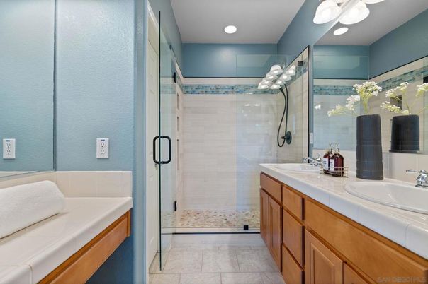 Bathroom, Dual Sink Vanities, Glass Shower, Interior, Recessed Lighting, Tile Countertops