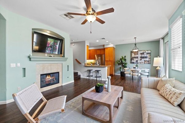 Dining room, Fireplace, Interior, Kitchen, Living room, Pendant Lights, Recessed Lighting, Stainless Steel Appliances, Wood Texture Flooring