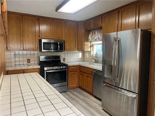 Interior, Kitchen, Tile Countertops, Wood Texture Flooring
