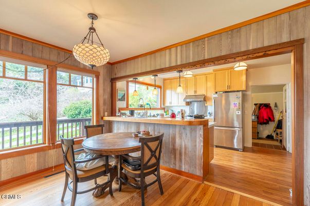 Dining room, Interior, Kitchen, Pendant Lights, Stainless Steel Appliances, Wood Texture Flooring