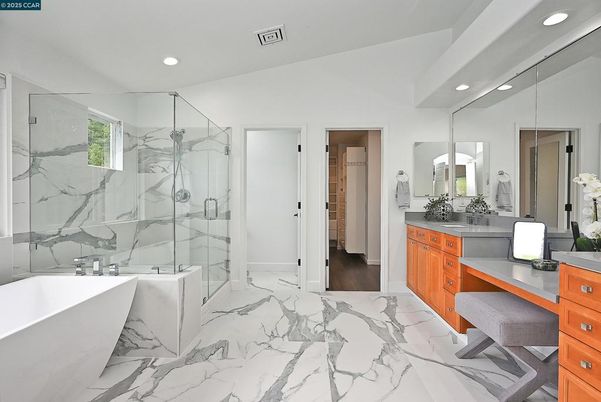Bathroom, Dual Sink Vanities, Free Standing Baths, Glass Shower, Interior, Marble, Marble Walls, Recessed Lighting