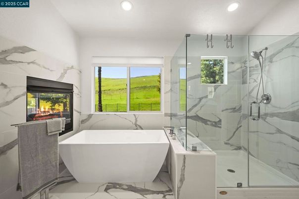 Bathroom, Free Standing Baths, Glass Shower, Interior, Marble, Marble Walls, Recessed Lighting