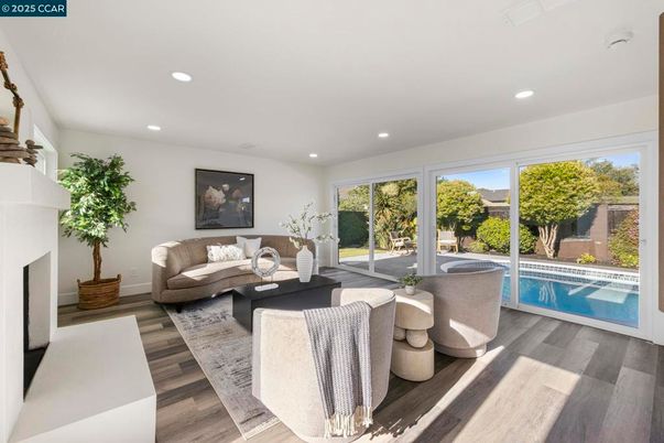 Fireplace, Interior, Living room, Recessed Lighting, Wood Texture Flooring