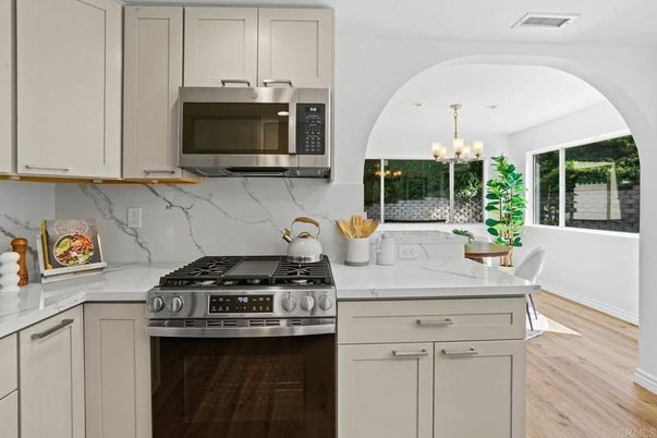 Chandelier, Interior, Kitchen, Marble Walls, Stainless Steel Appliances, Wood Texture Flooring