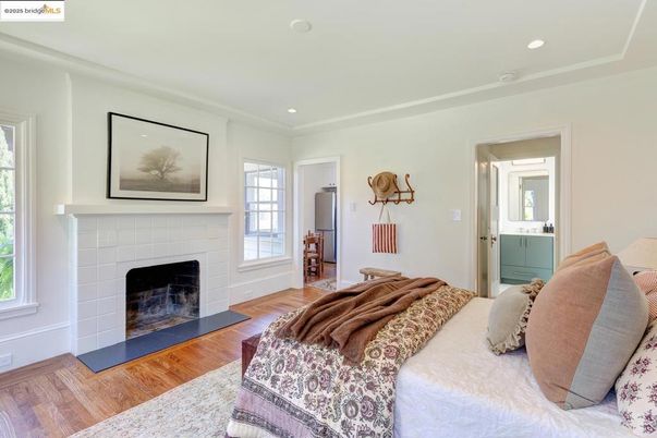 Bedroom, Fireplace, Interior, Recessed Lighting, Wood Texture Flooring