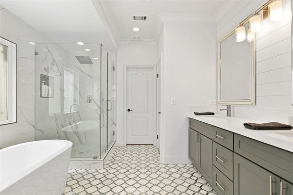 Bathroom, Dual Sink Vanities, Free Standing Baths, Glass Shower, Interior, Marble Walls, Recessed Lighting