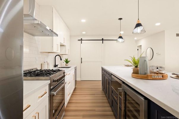 Interior, Kitchen, Pendant Lights, Recessed Lighting, Stainless Steel Appliances, Wood Texture Flooring