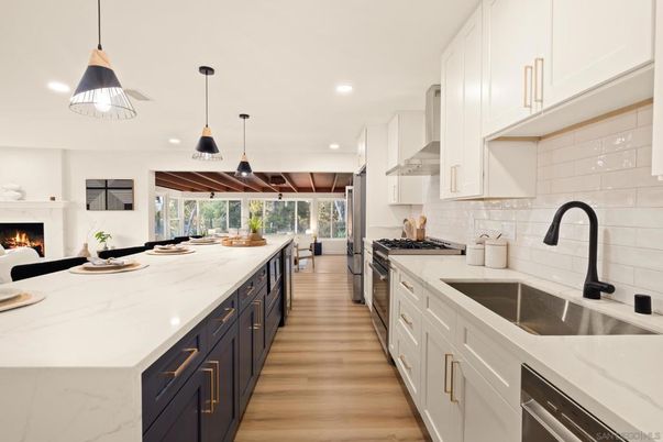 Fireplace, Interior, Kitchen, Pendant Lights, Recessed Lighting, Stainless Steel Appliances, Wood Texture Flooring