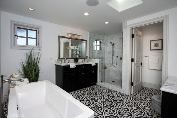 Bathroom, Dual Sink Vanities, Glass Shower, Interior, Marble Walls, Recessed Lighting