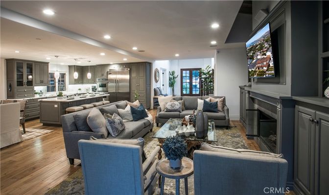Fireplace, Interior, Kitchen, Living room, Pendant Lights, Recessed Lighting, Stainless Steel Appliances, Wood Texture Flooring