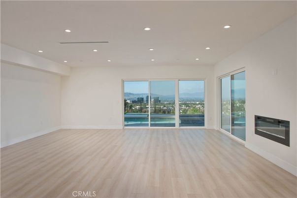Empty room, Fireplace, Interior, Recessed Lighting, Wood Texture Flooring