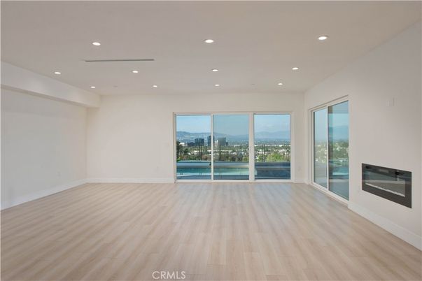 Empty room, Fireplace, Interior, Recessed Lighting, Wood Texture Flooring
