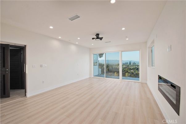 Empty room, Fireplace, Interior, Recessed Lighting, Wood Texture Flooring