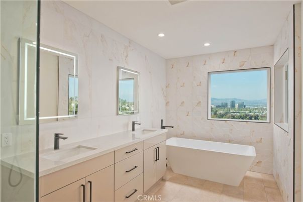Bathroom, Dual Sink Vanities, Free Standing Baths, Interior, Marble Walls, Recessed Lighting