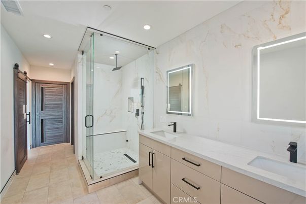 Bathroom, Dual Sink Vanities, Glass Shower, Interior, Marble Walls, Recessed Lighting