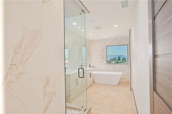Bathroom, Free Standing Baths, Glass Shower, Interior, Marble Walls, Recessed Lighting