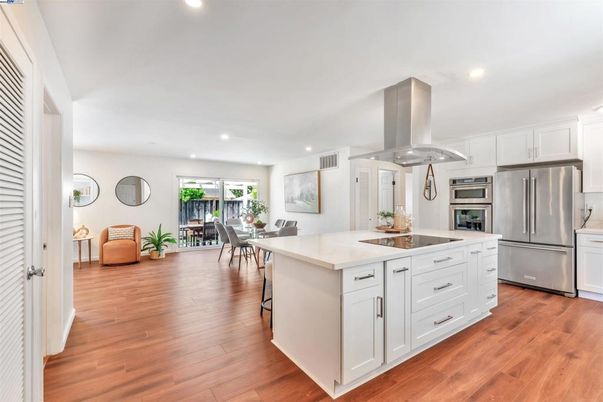 Dining room, Interior, Kitchen, Recessed Lighting, Stainless Steel Appliances, Wood Texture Flooring