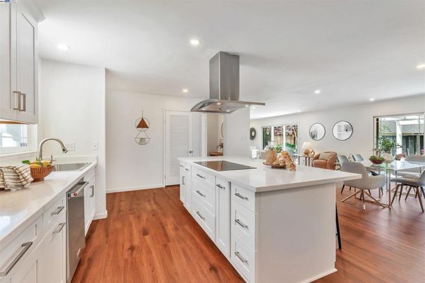 Dining room, Interior, Kitchen, Recessed Lighting, Stainless Steel Appliances, Wood Texture Flooring