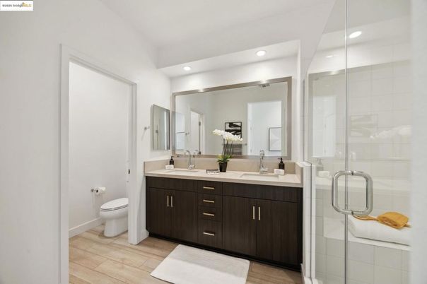 Bathroom, Dual Sink Vanities, Glass Shower, Interior, Recessed Lighting, Wood Texture Flooring